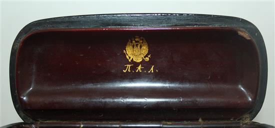 An early 19th century tortoiseshell snuff box & a Russian snuff box